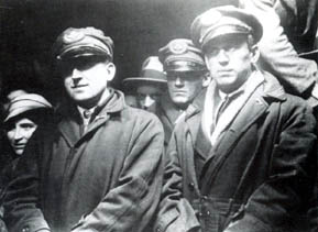 The crew of the Pelican listening to the many speeches on Schiphol, after their difficult but save landing